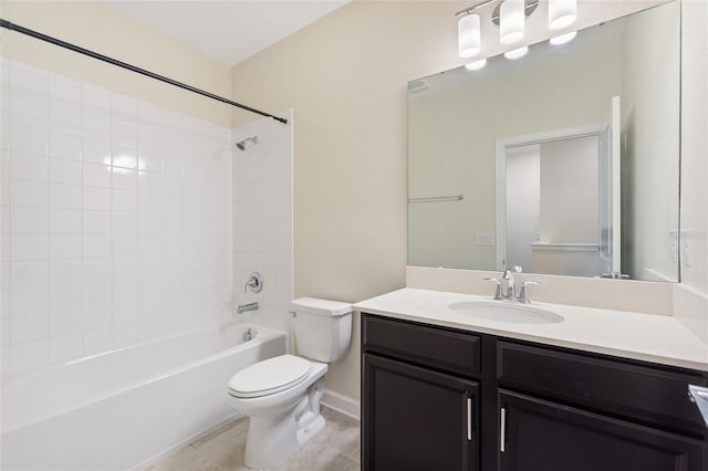 full bathroom featuring tile patterned floors, vanity, toilet, and tiled shower / bath