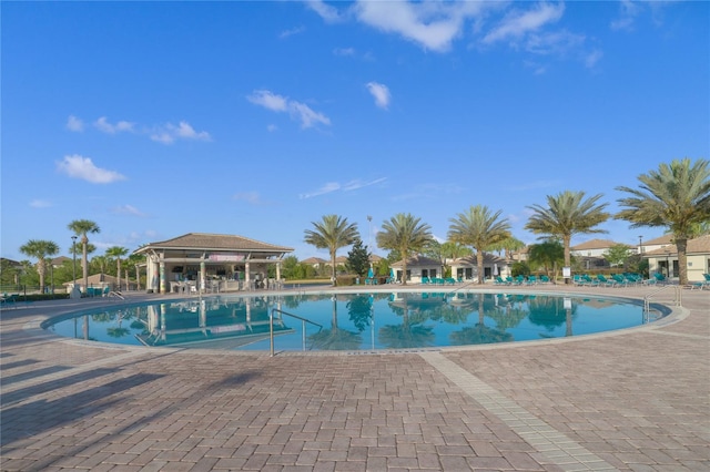 view of pool featuring a patio