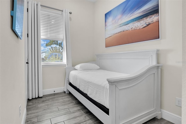 bedroom featuring light hardwood / wood-style flooring