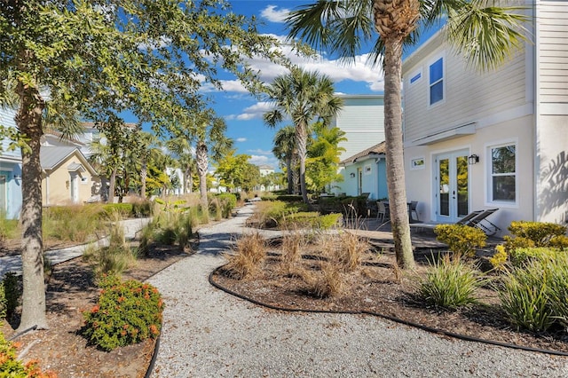 view of yard with french doors