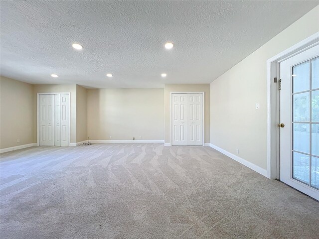 interior space with a textured ceiling