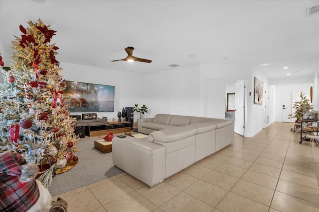 1651 Kingfisher Ct, Kissimmee, FL 34746 - living area with light tile patterned floors, recessed lighting, and ceiling fan