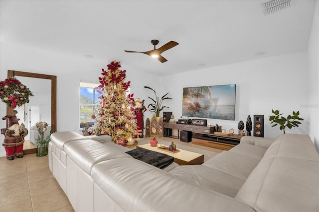 1651 Kingfisher Ct, Kissimmee, FL 34746 - living room with light tile patterned floors and ceiling fan