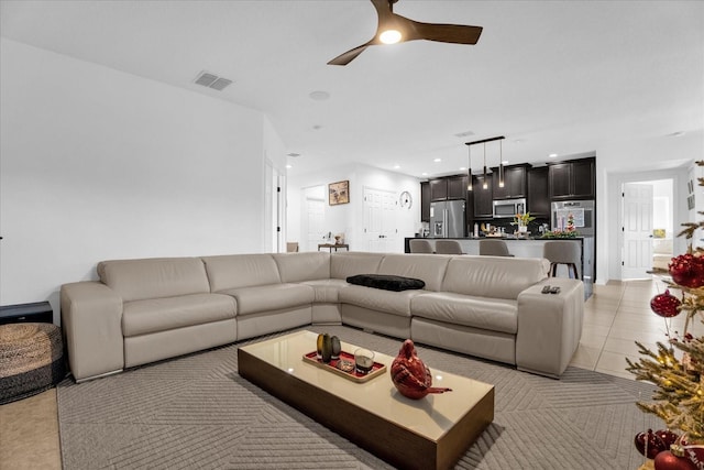 1651 Kingfisher Ct, Kissimmee, FL 34746 - living area featuring a ceiling fan, recessed lighting, and light tile patterned floors