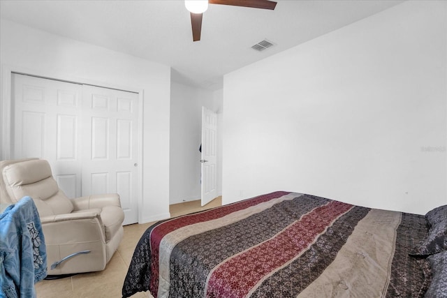 1651 Kingfisher Ct, Kissimmee, FL 34746 - bedroom featuring ceiling fan, a closet, and light tile patterned floors