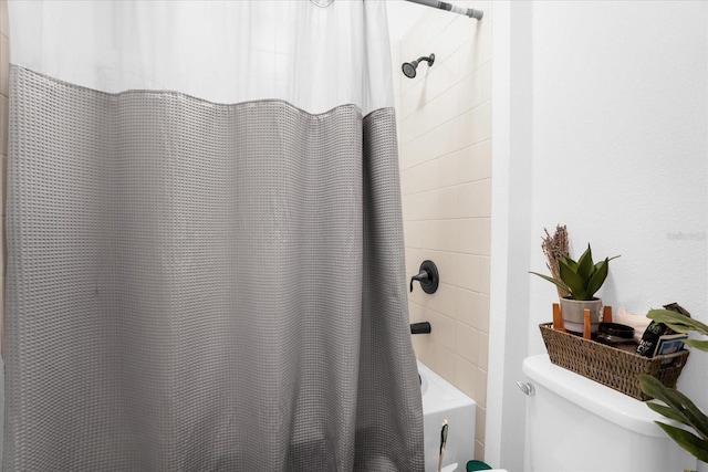 1651 Kingfisher Ct, Kissimmee, FL 34746 - bathroom with toilet and shower / bathtub combination with curtain
