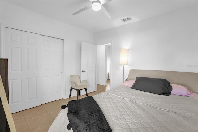 1651 Kingfisher Ct, Kissimmee, FL 34746 - bedroom with tile patterned floors, a ceiling fan, and a closet