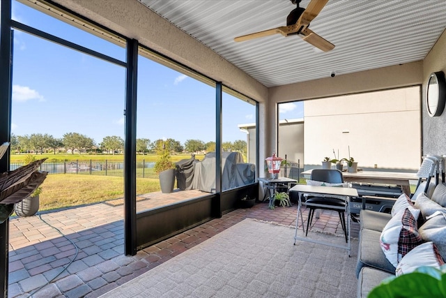 1651 Kingfisher Ct, Kissimmee, FL 34746 - sunroom / solarium featuring a ceiling fan, a water view, and an outdoor hangout area