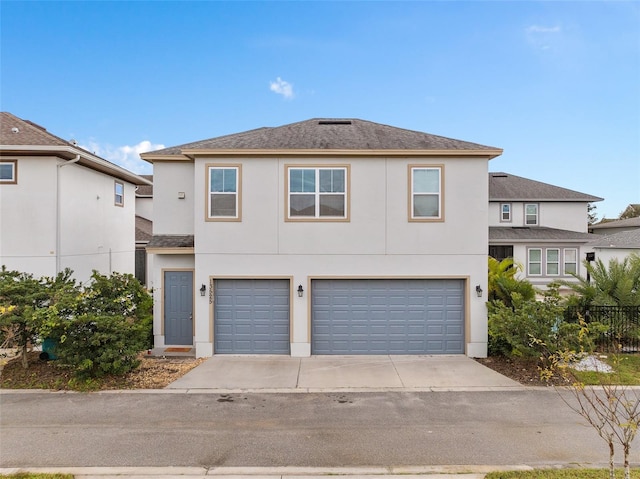 front of property featuring a garage