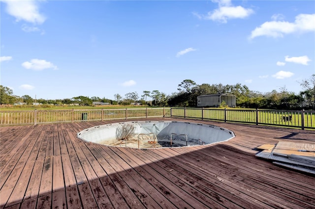 wooden terrace featuring a covered pool