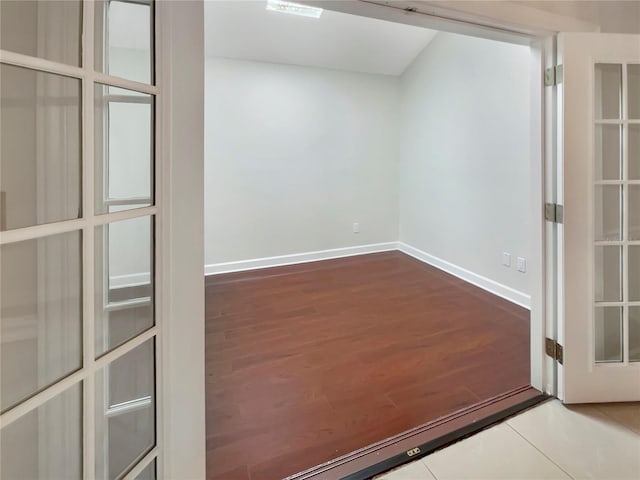 empty room with wood-type flooring