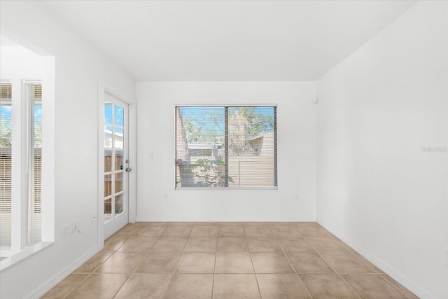 view of tiled spare room