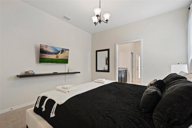 bedroom featuring light carpet and an inviting chandelier