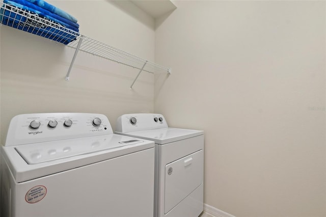 laundry area featuring washer and clothes dryer