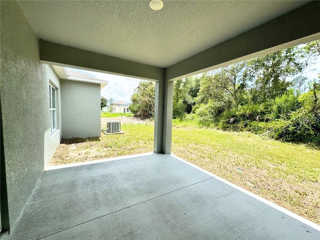 view of patio with central AC unit