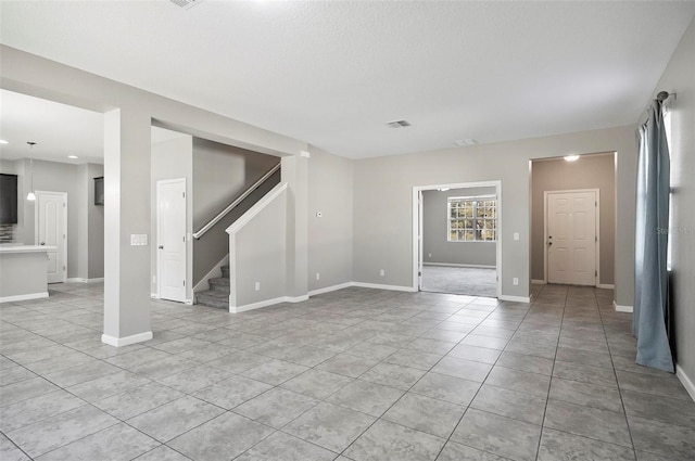 interior space featuring light tile patterned floors