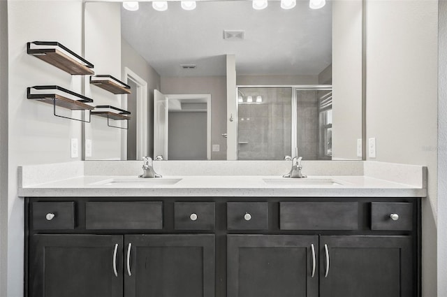 bathroom with vanity and an enclosed shower