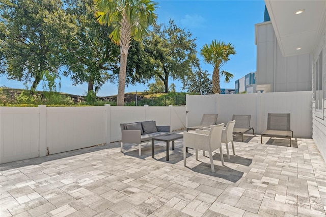 view of patio with an outdoor living space