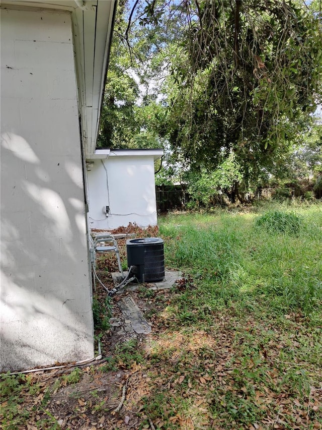 view of yard featuring central AC