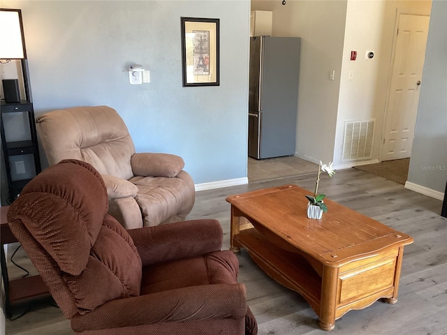 living room featuring light wood-type flooring