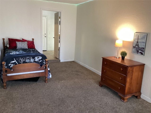 bedroom featuring light carpet