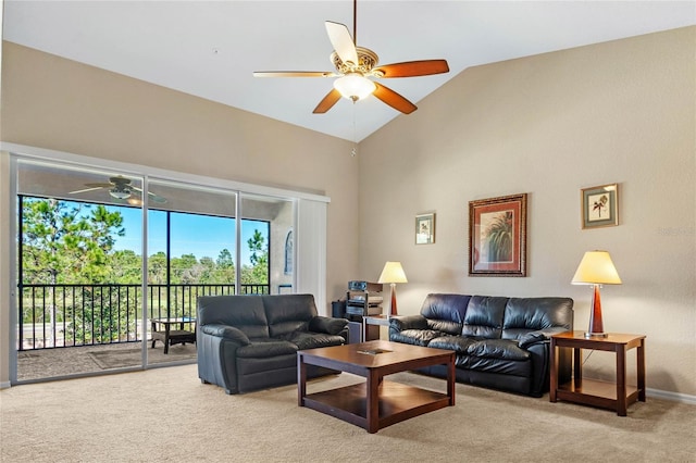 carpeted living room featuring ceiling fan and high vaulted ceiling