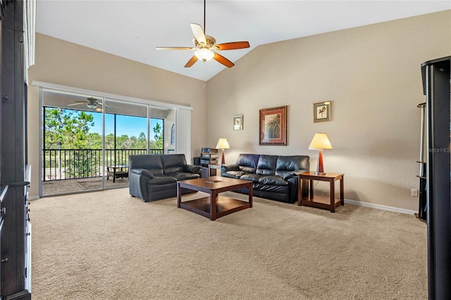 carpeted living room featuring ceiling fan and vaulted ceiling