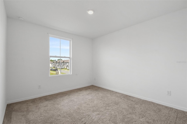 view of carpeted spare room