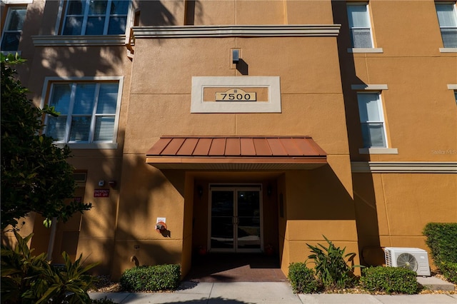 property entrance with ac unit