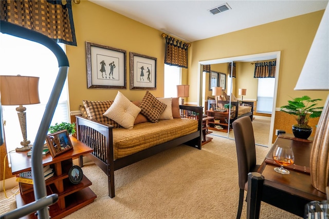 7500 Toscana Blvd Unit 341, Orlando, FL 32819 - carpeted living room featuring plenty of natural light