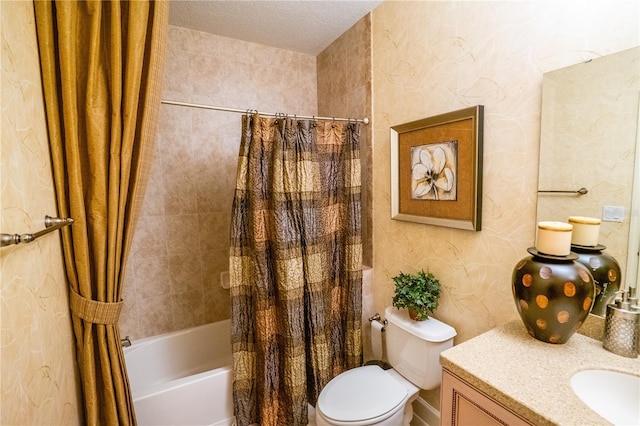 7500 Toscana Blvd Unit 341, Orlando, FL 32819 - full bath with shower / tub combo, toilet, vanity, a textured ceiling, and wallpapered walls