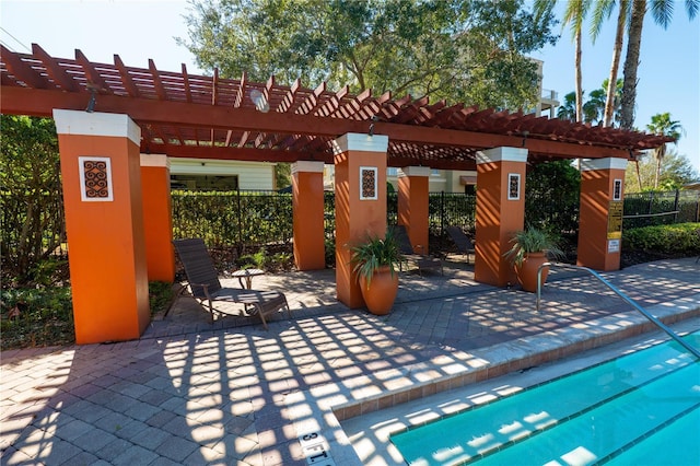 7500 Toscana Blvd Unit 341, Orlando, FL 32819 - view of swimming pool featuring a pergola and a patio