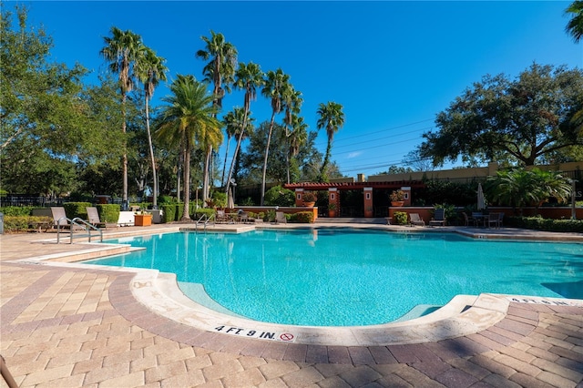 7500 Toscana Blvd Unit 341, Orlando, FL 32819 - community pool with a patio area