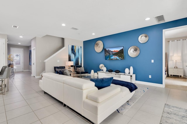 living room featuring light tile patterned flooring