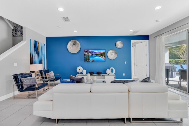 living room with light tile patterned floors