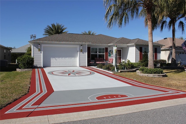 ranch-style home with a front yard and a garage