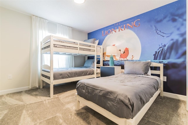 carpeted bedroom with baseboards