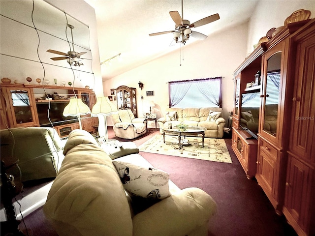 carpeted living room with ceiling fan and lofted ceiling