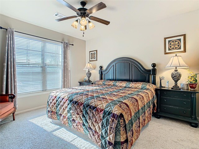 904 Charo Pkwy Unit 525, Davenport, FL 33897 - bedroom with ceiling fan and baseboards
