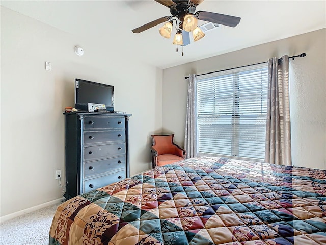 904 Charo Pkwy Unit 525, Davenport, FL 33897 - carpeted bedroom with baseboards and a ceiling fan