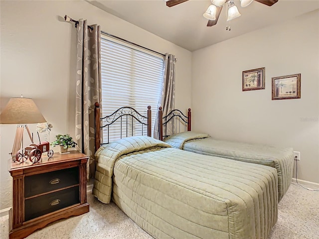 bedroom featuring ceiling fan