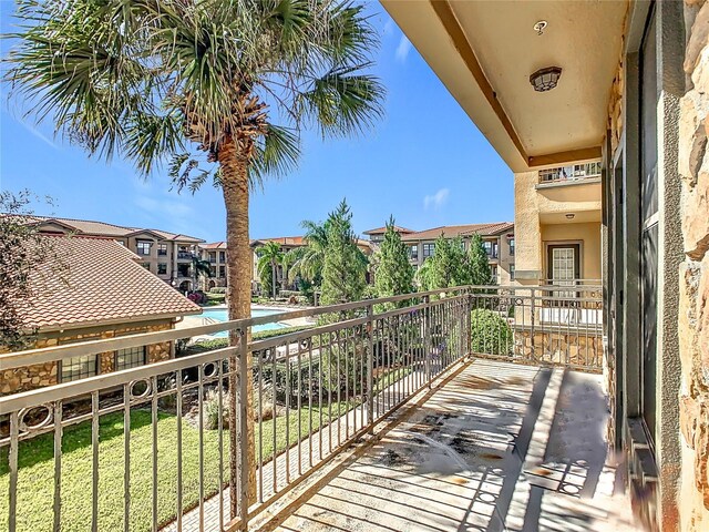 904 Charo Pkwy Unit 525, Davenport, FL 33897 - balcony featuring view of pool area and a residential view