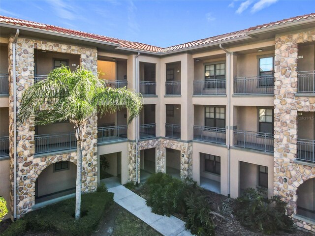 904 Charo Pkwy Unit 525, Davenport, FL 33897 - view of apartment building / complex