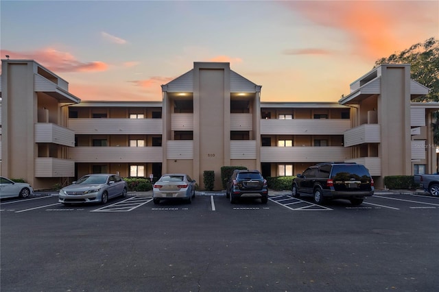 view of outdoor building at dusk