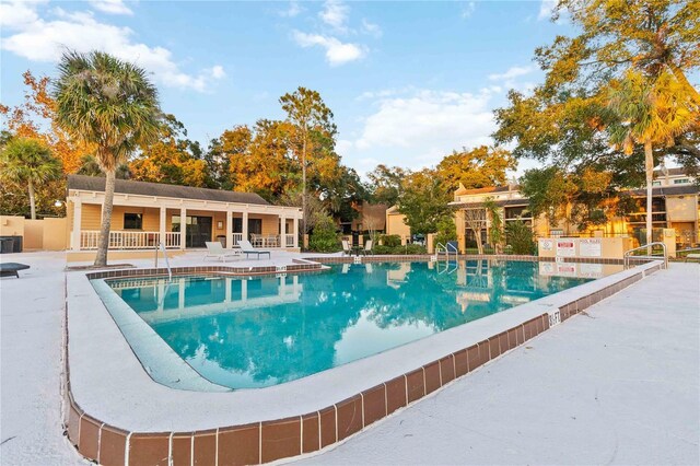 pool with a patio area