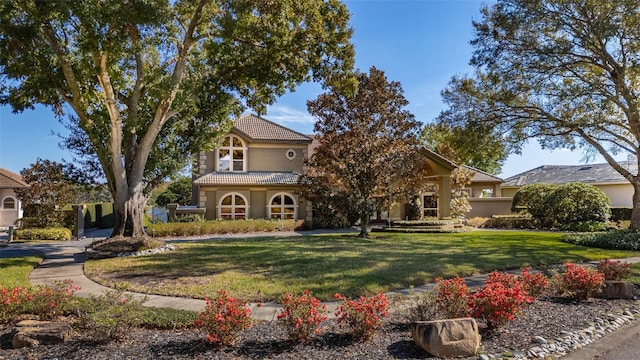 view of front of home with a front yard