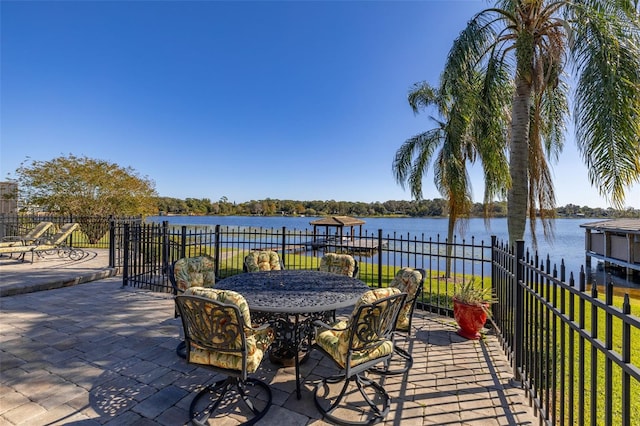 view of patio / terrace with a water view