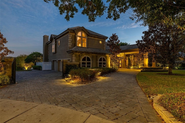 view of front of property with a garage