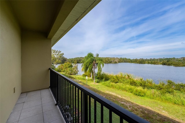 balcony featuring a water view