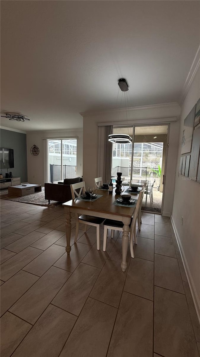 tiled dining area with ornamental molding